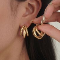 1 Pair XUPING Simple Style C Shape Plating 304 Stainless Steel 18K Gold Plated Raw Steel Ear Studs main image 3