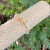 Einfacher Stil Klassischer Stil Bogenknoten Künstliche Perle Kupfer Überzug 18 Karat Vergoldet Frau Armbänder sku image 2