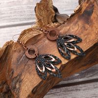 1 Pair Simple Style Classic Style Commute Maple Leaf Hollow Out Pu Leather Drop Earrings main image 2