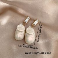 1 Pair Elegant Baroque Style Modern Style Irregular Inlay Arylic Alloy Artificial Pearls Zircon Drop Earrings Ear Cuffs sku image 1