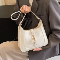 Femmes Moyen Faux Cuir Couleur Unie Style Vintage Style Classique Fermeture Éclair Sac Sous Les Bras main image 3