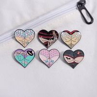 Estilo De Dibujos Animados Lindo Estilo Vaquero Letra Forma De Corazón Aleación Estampado Barniz De Estufa Mujeres Broches main image 2