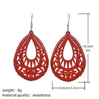 1 Pair Casual Ethnic Style Water Droplets Stoving Varnish Hollow Out Wood Drop Earrings main image 2