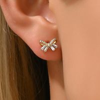 1 Pair Sweet Shiny Bow Knot Hollow Out Inlay Copper Zircon White Gold Plated Gold Plated Ear Studs main image 3
