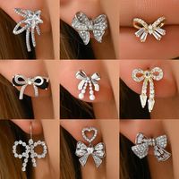1 Pair Sweet Shiny Bow Knot Hollow Out Inlay Copper Zircon White Gold Plated Gold Plated Ear Studs main image 1