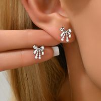 1 Pair Sweet Shiny Bow Knot Hollow Out Inlay Copper Zircon White Gold Plated Gold Plated Ear Studs main image 5