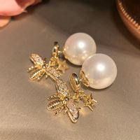 1 Pair Elegant Lady Modern Style Bee Inlay Copper Artificial Pearls Zircon Ear Studs main image 1