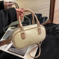 Women's Medium Pu Leather Solid Color Flower Bow Knot Basic Classic Style Oval Zipper Crossbody Bag main image 2
