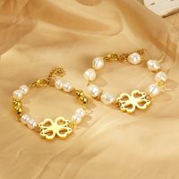 304 Stainless Steel Resin Simple Style Beaded Hollow Out Flower Bracelets main image 1