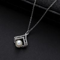 Wholesale Jewelry Cute Shiny Geometric Bear Heart Shape Alloy Rhinestones Pearl Hollow Out Inlay Pendant Necklace main image 4