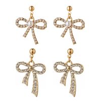 1 Pair Simple Style Classic Style Bow Knot Plating Inlay Alloy Rhinestones Gold Plated Silver Plated Drop Earrings main image 1