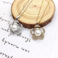 Simple Style Classic Style Rose Flower Petal Alloy Plating Inlay Rhinestones Gold Plated Silver Plated Women's Earrings Necklace main image 1