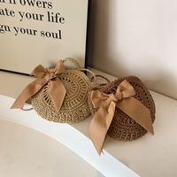 Women's Medium Straw Solid Color Vacation Beach Ribbon Weave Round Zipper Straw Bag main image 6