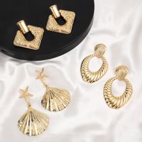 1 Pair Casual Simple Style Classic Style Oval Starfish Shell Alloy Drop Earrings main image 1