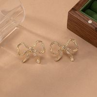 1 Pair Simple Style Shiny Bow Knot Plating Inlay Alloy Rhinestones 14K Gold Plated Ear Studs main image 3