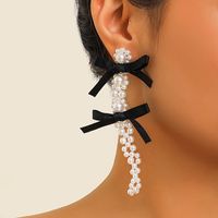 1 Pair Elegant Lady Bow Knot Inlay Alloy Pearl Drop Earrings main image 6