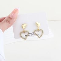 1 Pair Sweet Simple Style Heart Shape Hollow Out Inlay Alloy Rhinestones Gold Plated Drop Earrings main image 1