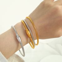 Acier Au Titane Plaqué Or 18K Style Simple Rond Placage Lignes Bracelets main image 1