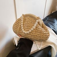 Women's Medium Straw Solid Color Vacation Beach Beading Weave Clasp Frame Straw Bag main image 2