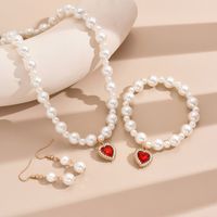 Elegant Einfacher Stil Glänzend Herzform Künstliche Perle Legierung Perlen Inlay Strasssteine Frau Schmuck-Set main image 5