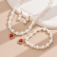 Elegant Einfacher Stil Glänzend Herzform Künstliche Perle Legierung Perlen Inlay Strasssteine Frau Schmuck-Set main image 7