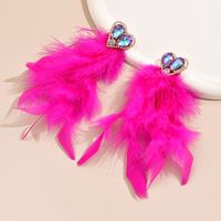 1 Paire Exagéré Nouveauté Style Cool Forme De Cœur Incruster Plume Artificielle Alliage Strass Boucles D'oreilles main image 4