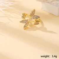 Le Cuivre Plaqué Or 18K De Base Style Moderne Style Classique Incruster Paume Papillon Tourner Perles Artificielles Zircon Anneau Ouvert main image 2