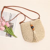 Women's Medium Straw Solid Color Vacation Beach Tassel Weave Zipper Straw Bag main image 4