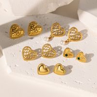 1 Pair Elegant Commute Heart Shape Hollow Out Inlay 304 Stainless Steel Artificial Rhinestones Plastic 18K Gold Plated Ear Studs main image 1