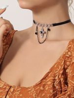 Großhandel Schmuck Moderner Stil Klassischer Stil Toller Stil Kreuzen Sonne Bogenknoten Kunstharz Synthetische Faser Legierung Strasssteine Inlay Halskette Mit Anhänger main image 3