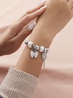 Cute Sweet Human Flower Bow Knot Synthetic Resin Alloy Copper Inlay Rhinestones Women's Bracelets main image 1