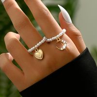 Simple Style Classic Style Moon Artificial Pearl Alloy Beaded Women's Rings main image 1