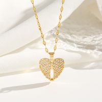 Wholesale Exaggerated Shiny Heart Shape Wings Titanium Steel Copper Inlay Zircon Pendant Necklace sku image 1