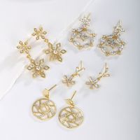 1 Paire Glamour XUPING Sucré Rond Fleur Flocon De Neige Incruster Le Cuivre Pierres Précieuses Artificielles Plaqué Or 18K Boucles D'oreilles main image 1