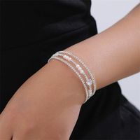 Simple Style Geometric Artificial Gemstones Artificial Pearl Zinc Alloy Layered Inlay Rhinestones Pearl Women's Wristband main image 1