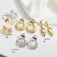 1 Paire Style Vintage Style Simple Commuer Rond Couleur Unie Évider Le Cuivre Plaqué Or 14K Boucles D'oreilles Des Boucles D'Oreilles main image 2