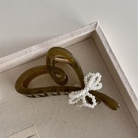 Frau Einfacher Stil Klassischer Stil Einfarbig Kunststoff Harz Perlen Haarkrallen sku image 1