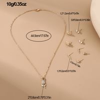 IG Style Modern Style Simple Style Fruit Heart Shape Bow Knot Alloy Inlay Artificial Pearls Rhinestones Women's Earrings Necklace main image 2