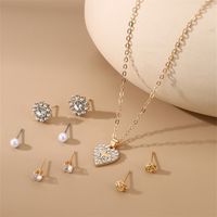 IG Style Modern Style Simple Style Fruit Heart Shape Bow Knot Alloy Inlay Artificial Pearls Rhinestones Women's Earrings Necklace main image 8