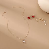 IG Style Modern Style Simple Style Fruit Heart Shape Bow Knot Alloy Inlay Artificial Pearls Rhinestones Women's Earrings Necklace main image 9