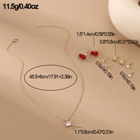 IG Style Modern Style Simple Style Fruit Heart Shape Bow Knot Alloy Inlay Artificial Pearls Rhinestones Women's Earrings Necklace main image 3