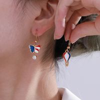 1 Pair XUPING Simple Style Hot Air Balloon Heart Shape Butterfly Enamel Plating 304 Stainless Steel Artificial Gemstones Artificial Pearls 18K Gold Plated Ear Hook main image 4
