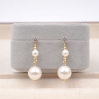 1 Pair Modern Style Simple Style Geometric Inlay Artificial Pearl Copper Zircon Gold Plated Drop Earrings main image 1