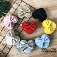Unisex Small Pu Leather Solid Color Bow Knot Cute Heart-shaped Zipper Crossbody Bag main image 1
