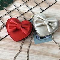 Unisex Small Pu Leather Solid Color Bow Knot Cute Heart-shaped Zipper Crossbody Bag main image 2