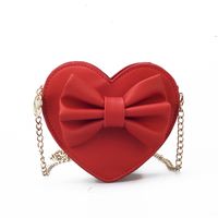 Unisex Small Pu Leather Solid Color Bow Knot Cute Heart-shaped Zipper Crossbody Bag main image 5