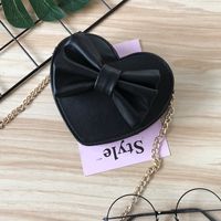 Unisex Small Pu Leather Solid Color Bow Knot Cute Heart-shaped Zipper Crossbody Bag sku image 1