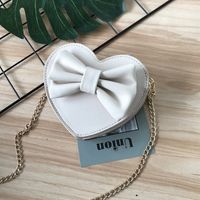 Unisex Small Pu Leather Solid Color Bow Knot Cute Heart-shaped Zipper Crossbody Bag sku image 3