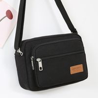 Men's Small Canvas Solid Color Basic Classic Style Zipper Crossbody Bag main image 3