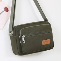 Men's Small Canvas Solid Color Basic Classic Style Zipper Crossbody Bag main image 2
